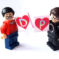 alt="dan and phil mini figures, lego toys"